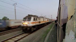 HWH WAP7 30522 leads 12301 Howrah RAJDHANI parallely overtakes 36085 Masagram EMU at 130KMPH [upl. by Anirt]