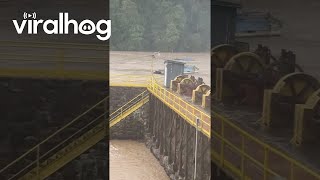 Pontoon Boat Goes Over Flooded Dam in Virginia  ViralHog [upl. by Clifton]