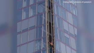 Free climber scales 310metre Shard skyscraper without ropes [upl. by Aneen]