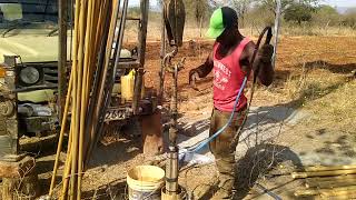 BOREHOLE EQUIPPINGPUMP INSTALLATION AT MULANGO AREA KITUI COUNTY  KENYA [upl. by Natam]