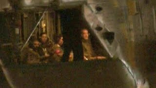 Released hostages on board helicopter landing at Israeli hospital  AFP [upl. by Euqinay702]