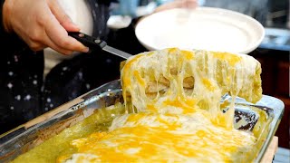 How to make FAMOUS Mexican WET Smothered Chile Verde BURRITOS Recipe [upl. by Yellac472]