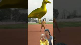 Boy kick ball and smashes the golden status of flat bill of duck on the football ground short [upl. by Rico]