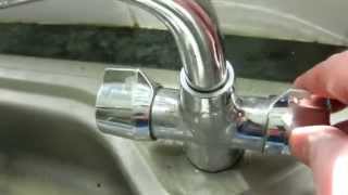 How to stop a monobloc tap outlet leaking emergency repair [upl. by Sral834]