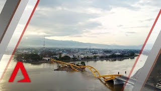 Drone footage of tsunamihit Indonesian city Palu [upl. by Zephaniah]