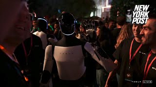 Elon Musk’s Optimus humanoid robots steal show at Tesla event ‘Will be the biggest product ever’ [upl. by Mcevoy607]