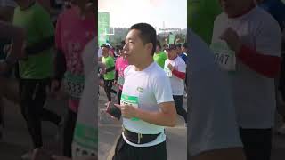 Man in China interrupts halfmarathon attempting to be in winner’s photo shorts [upl. by Iphigeniah]