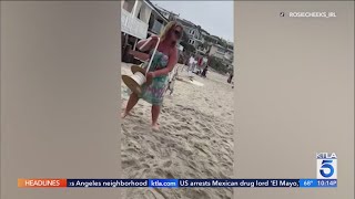 Laguna Beach woman lashes out at beachgoers in viral video [upl. by Aicertal850]