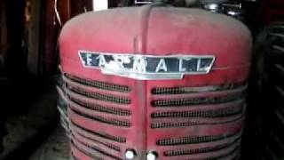 Old Red 1947 Farmall Super M Tractor Still Running Strong [upl. by Ahilam]