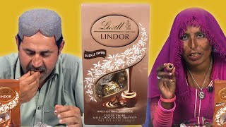 Tribal People Try Lindt Chocolate For The First Time [upl. by Yunfei]