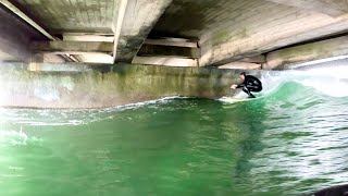 Surfing RARE under bridge Novelty wave [upl. by Hebbe]