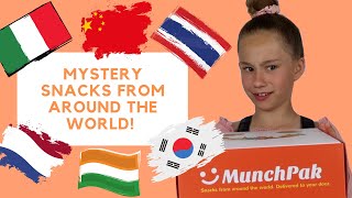 TRYING FOOD FROM AROUND THE WORLD  MYSTERY SNACK BOX CHALLENGE [upl. by Enaxor]