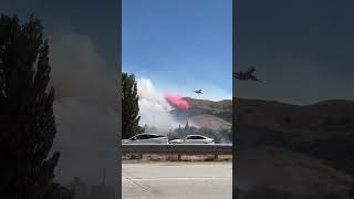 DC10 dropping PhosChek fire retardant on fire near Gorman California [upl. by Atwahs]