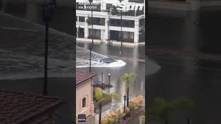 Tesla plows through flooded San Diego street with ease [upl. by Adler787]