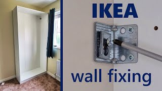 How to attach Ikea wardrobe to the wall [upl. by Nedyarb76]