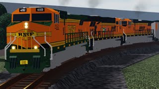 Bnsf coal train with the 25th anniversary unit passing a crossing in RSR￼￼ [upl. by Aninahs]