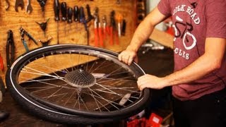 How to Put on New Bike Tire amp Tube  Bicycle Repair [upl. by Xila]