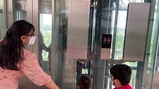 Mitsubishi Lift  Glass lift  Worldmark Sector 65  Short Elevator ride [upl. by Gadmann594]