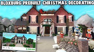 DECORATING A BLOXBURG PREBUILT HOUSE FOR CHRISTMAS i discovered something new [upl. by Estella4]