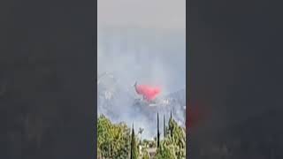 A plane drops retardant on The Garden Fire 110824 [upl. by Lesirg]