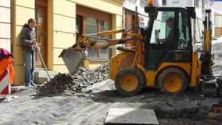 Backhoe JCB 1CX in the city [upl. by Gunthar775]