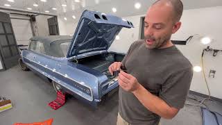 1964 Chevy impala convertible installing the trim and tail lights on the back of the car [upl. by Ab]