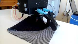 Robotic Gripper for grasping cloths unfolding [upl. by Sirkin]