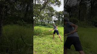 Testing scythe blade on grass shorts farming scythe farmer [upl. by Hildagard]