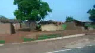 Views along the road in Ghana with mud huts [upl. by Ricky]