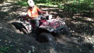 1986 honda trx 350 4x4 mudding and gets stuck [upl. by Silisav172]