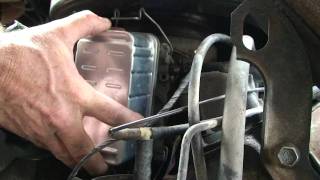 CHANGING DIESEL FUEL FILTER 1988 GMC 62 DIESEL VAN [upl. by Nosyt]