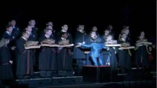 Warwick Davis conducts Hogwarts Frog Choir at Wizarding World of Harry Potter opening event [upl. by Taveda]