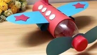 عمل طائره من زجاجه ميه فارغه وورق ملون How to make plane from water bottle and colors papers [upl. by Mayap808]