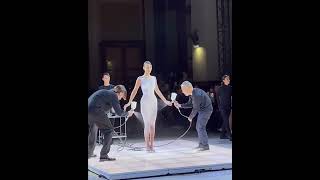 Bella Hadid Gets a Dress SprayPainted on Her Body at Coperni [upl. by Htinek]