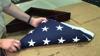 How to Fold a Flag for Putting it into a Memorial Case [upl. by Nnyliak]