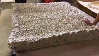 How to roll pocket coil mattress [upl. by Aiyekal]