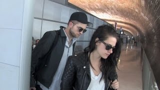 Kristen Stewart quotin lovequot with Robert Pattinson at Charles de Gaulle airport heading back to LA [upl. by Betta654]