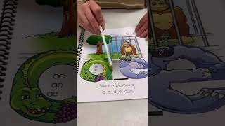 Amazing Action Alphabet Vowel Kingdom book [upl. by Hortensa331]