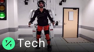 BrainControlled Exoskeleton Allows Paralyzed Man to Walk [upl. by Samella735]