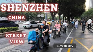 Shenzhen China HI TECH City Street View Electric Bikes Everywhere Busy Road peoplewatching [upl. by Elleinahc]