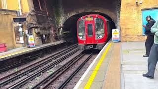 District line London Underground train arriving at Paddington station [upl. by Ballinger538]