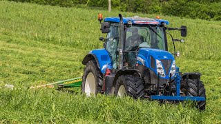 Silage is a go Mowing from above New Holland T7 210 John Deere 328A Mower [upl. by Ahtibbat530]