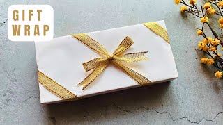 Easy Way to Wrap a Ribbon on a Christmas Gift Box  How to Wrap a Gift with Ribbon Easy christmas [upl. by Germin]