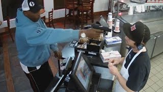 Watch Unfazed Cashier Keep His Cool During Terrifying Gunpoint Robbery [upl. by Ahsie]