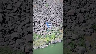 Guy base jumps off the Perrine Memorial Bridge in Twin Falls Idaho with an inflatable boat [upl. by Atival]