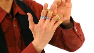 How to Do the Jumping Rubber Band Trick  Magic Tricks [upl. by Slaohcin]