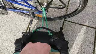 How to attach almost any backpack to your bicycle rack [upl. by Kendricks]