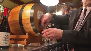 Watch Beaujolais Nouveau wine uncorked after midnight in Paris [upl. by Lleznol]