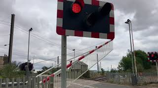 A Consecutive Closure 15 seconds apart with 5 trains at Helpston Level Crossing Cambridgeshire [upl. by Noissap]