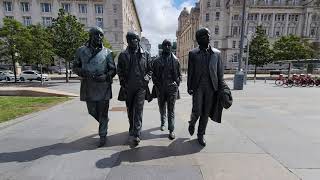 The Beatles Statues 3 Muses Mersey Ferry at Pier Head Liverpool Merseyside England UK United Kingdom [upl. by Nner710]